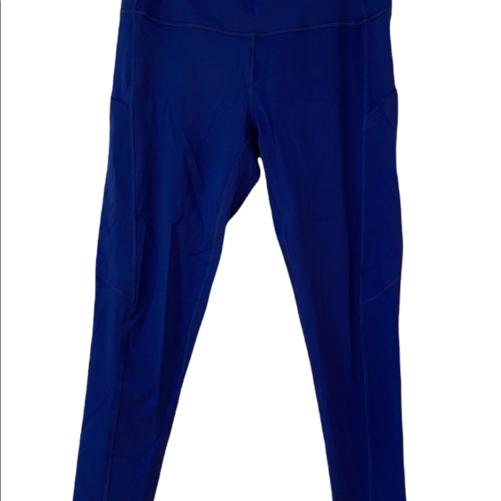 BRAND NEW—Navy leggings with 5 pockets  back waistband &  2 leg pockets! Sz L.